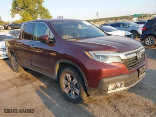 2017 Honda Ridgeline RTL-E with VIN 5FPYK3F74HB029959, listed as a IAAI auction lot 40530840 with 95,596 mi miles. Bid and sale history available at carsss.com. Image 1.