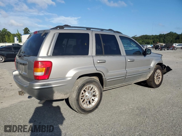 2002 Jeep Grand Cherokee Limited with VIN 1J4GX58S32C149852, listed as a Copart auction lot 71655864 with 190,918 mi miles and Salvage Title. Bid and sale history available at DreamBid. Image 3.