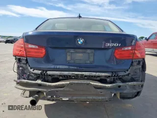 2015 BMW 3 Series 320i with VIN WBA3B1C58FK140327, listed as a Copart auction lot 57999675 with 124,437 mi miles and Salvage title. Bid and sale history available at DreamBid. Image 6.