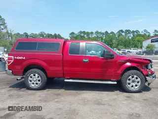 2014 Ford F-150 XL z VIN 1FTFX1EF5EFA27093, wystawiony jako IAAI lot #42586464 z przebiegiem 140 178 mil mil oraz . Historia ofert i sprzedaży dostępna na DreamBid. Obrazek 13.