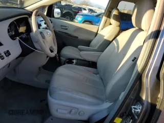 2011 Toyota Sienna XLE AAS with VIN 5TDYK3DC1BS170855, listed as a Copart auction lot 86829904 with 142,117 mi miles and Salvage Title. Bid and sale history available at carsss.com. Image 7.