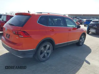 2018 Volkswagen Tiguan SEL Premium with VIN 3VV5B7AX8JM116146, listed as a IAAI auction lot 41738184 with 163,731 mi miles and . Bid and sale history available at DreamBid. Image 4.