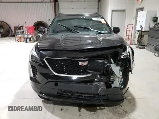 2020 Cadillac XT4 AWD Sport с VIN 1GYFZFR46LF006695, выставлен на аукционе Copart как лот 83306014 с пробегом 33 376 миль миль и Списание • Salvage title. История ставок и продаж доступна на DreamBid. Изображение 5.