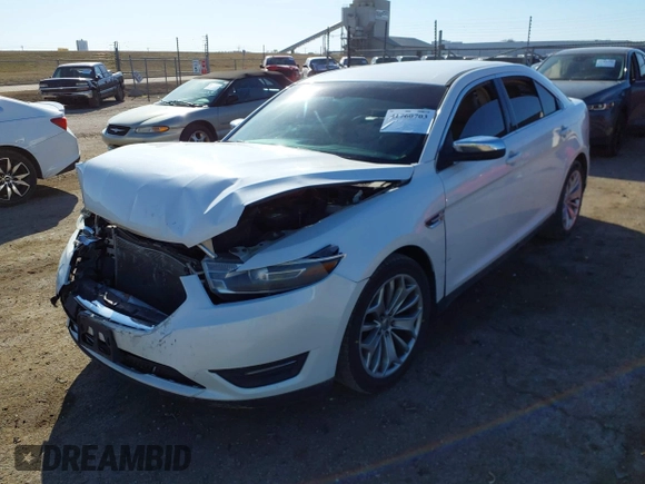 2014 Ford Taurus Limited with VIN 1FAHP2F89EG155934, listed as a IAAI auction lot 41760703 with 130,280 mi miles. Bid and sale history available at carsss.com. Image 2.