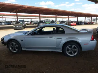 2001 Ford Mustang GT Deluxe z VIN 1FAFP42X11F210649, wystawiony jako IAAI lot #42052467 z przebiegiem 140 675 mil mil oraz . Historia ofert i sprzedaży dostępna na DreamBid. Obrazek 15.