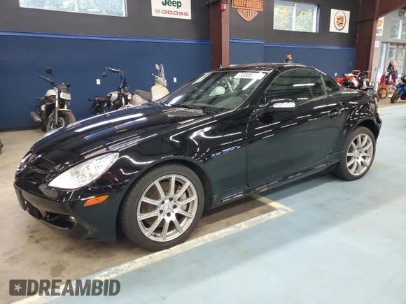 2005 Mercedes-Benz SLK-Class with VIN WDBWK56FX5F049285, listed as a Copart auction lot 73306494 with 94,785 mi miles and Salvage Title. Bid and sale history available at carsss.com. Image 1.