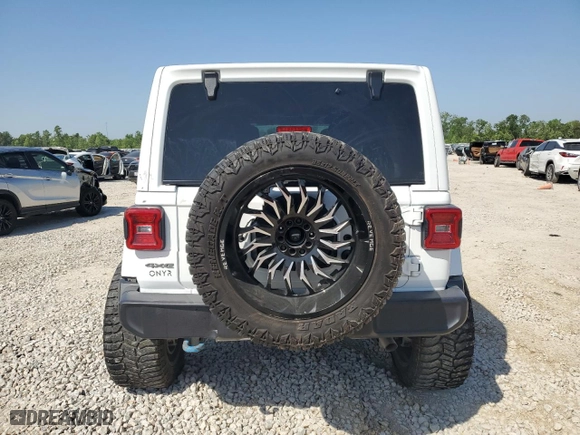 2023 Jeep Wrangler 4xe Sahara with VIN 1C4JJXP62PW524570, listed as a Copart auction lot 52927855 with 54,254 mi miles and Salvage Title. Bid and sale history available at carsss.com. Image 6.
