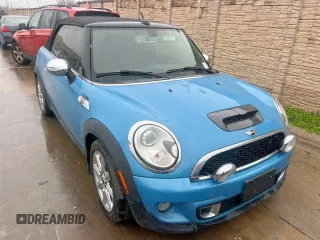 2014 MINI Convertible S with VIN WMWZP3C57ET706977, listed as a Copart auction lot 45777855 with 77,175 mi miles and Clean Title. Bid and sale history available at DreamBid. Image 1.