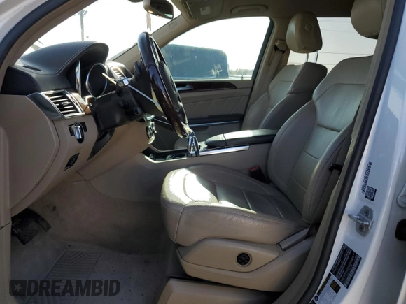 2014 Mercedes-Benz GL 450 z VIN 4JGDF7CE0EA395164, wystawiony jako Copart lot #51081185 z przebiegiem 92 321 mil mil oraz Szkody całkowita. Historia ofert i sprzedaży dostępna na DreamBid. Obrazek 7.
