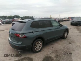 2019 Volkswagen Tiguan S z VIN 3VV1B7AXXKM121963, wystawiony jako IAAI lot #40076115 z przebiegiem 167 540 mil mil oraz . Historia ofert i sprzedaży dostępna na DreamBid. Obrazek 4.