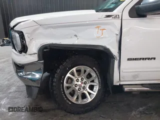 2018 GMC Sierra 1500 SLE z VIN 3GTU2MEC5JG104843, wystawiony jako IAAI lot #42447744 z przebiegiem 136 874 mil mil oraz . Historia ofert i sprzedaży dostępna na DreamBid. Obrazek 18.