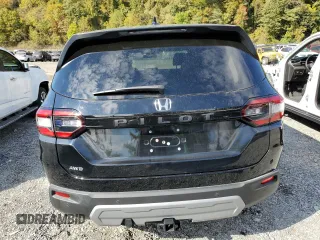 2024 Honda Pilot EX-L 7 Passenger with VIN 5FNYG1H51RB019899, listed as a Copart auction lot 75478704 with 7,397 mi miles and Salvage Title. Bid and sale history available at carsss.com. Image 6.