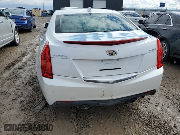 2016 Cadillac ATS Standard AWD z VIN 1G6AG5RX1G0157420, wystawiony jako Copart lot #70697003 z przebiegiem Nie podano mil oraz Szkoda całkowita • Salvage title. Historia ofert i sprzedaży dostępna na DreamBid. Obrazek 6.