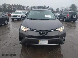 2018 Toyota RAV4 XLE with VIN 2T3RFREV5JW798328, listed as a IAAI auction lot 41868104 with 61,076 mi miles. Bid and sale history available at carsss.com. Image 12.