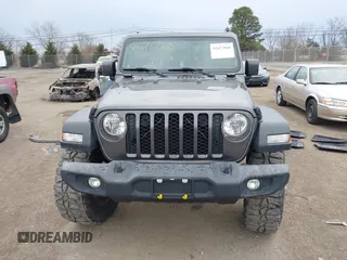 2020 Jeep Gladiator Sport S with VIN 1C6HJTAG8LL141535, listed as a IAAI auction lot 41673860 with 67,160 mi miles. Bid and sale history available at carsss.com. Image 12.