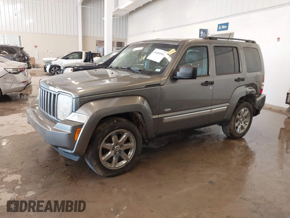 2012 Jeep Liberty Sport with VIN 1C4PJMAK9CW176792, listed as a IAAI auction lot 41685594 with 213,748 mi miles. Bid and sale history available at carsss.com. Image 18.