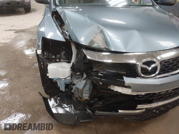 2012 Mazda CX-9 Touring z VIN JM3TB3CV8C0358099, wystawiony jako IAAI lot #41478110 z przebiegiem 151 716 mil mil oraz . Historia ofert i sprzedaży dostępna na DreamBid. Obrazek 6.