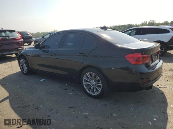 2018 BMW 3 Series 330i xDrive with VIN WBA8D9G56JNU69320, listed as a Copart auction lot 60794345 with 104,036 mi miles and Salvage title. Bid and sale history available at DreamBid. Image 2.