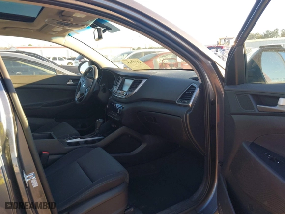 2018 Hyundai Tucson Value with VIN KM8J3CA2XJU776526, listed as a IAAI auction lot 41322657 with 102,444 mi miles. Bid and sale history available at carsss.com. Image 5.