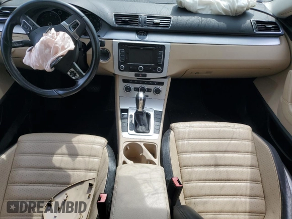 2014 Volkswagen CC Sport with VIN WVWBN7AN3EE528302, listed as a Copart auction lot 69636034 with 77,332 mi miles and Salvage Title. Bid and sale history available at DreamBid. Image 8.