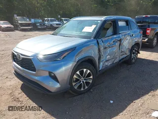 2023 Toyota Highlander L with VIN 5TDKDRAH7PS038449, listed as a IAAI auction lot 42298596 with 112,275 mi miles and . Bid and sale history available at DreamBid. Image 2.