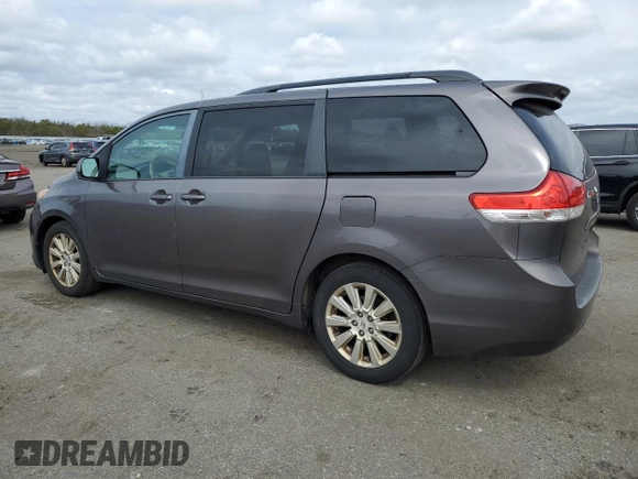2012 Toyota Sienna XLE with VIN 5TDDK3DC2CS038316, listed as a Copart auction lot 52694245 with 273,415 mi miles and Clean Title. Bid and sale history available at DreamBid. Image 2.