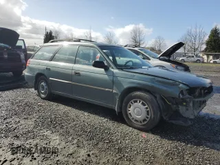 1995 Subaru Legacy L with VIN 4S3BK6358S6352272, listed as a Copart auction lot 46073325 with 211,502 mi miles and Salvage title. Bid and sale history available at DreamBid. Image 4.