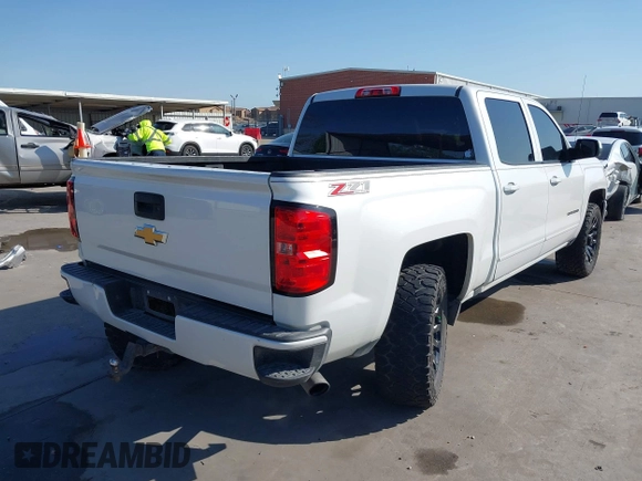 2016 Chevrolet Silverado 1500 LT with VIN 3GCUKREC8GG366278, listed as a IAAI auction lot 41993038 with 176,515 mi miles and . Bid and sale history available at DreamBid. Image 4.