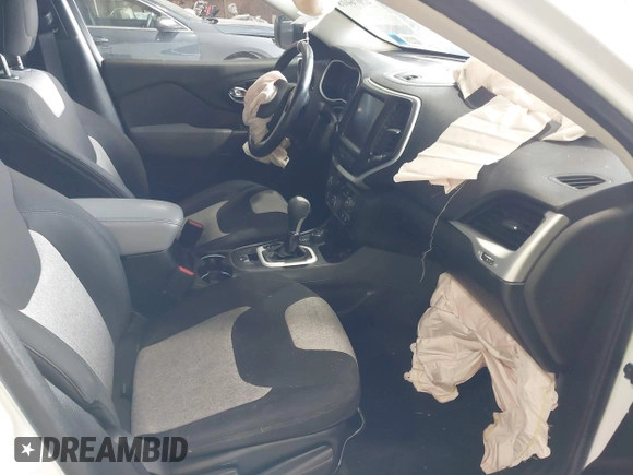 2014 Jeep Cherokee Altitude with VIN 1C4PJMCB7EW186432, listed as a IAAI auction lot 42076018 with 150,186 mi miles and . Bid and sale history available at DreamBid. Image 5.