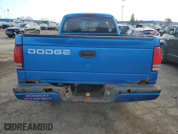 1998 Dodge Dakota SLT z VIN 1B7FL26X3WS633719, wystawiony jako Copart lot #82381914 z przebiegiem Nie podano mil oraz Szkoda całkowita • Salvage title. Historia ofert i sprzedaży dostępna na DreamBid. Obrazek 6.