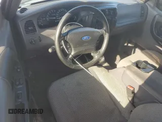 2002 Ford Ranger XL with VIN 1FTYR14U72TA19237, listed as a Copart auction lot 62276095 with 74,517 mi miles and Salvage title. Bid and sale history available at DreamBid. Image 8.