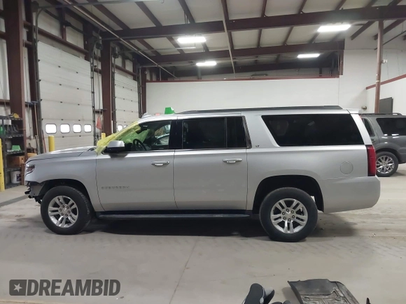 2018 Chevrolet Suburban LT with VIN 1GNSKHKC7JR115885, listed as a IAAI auction lot 41716347 with 115,393 mi miles. Bid and sale history available at carsss.com. Image 14.