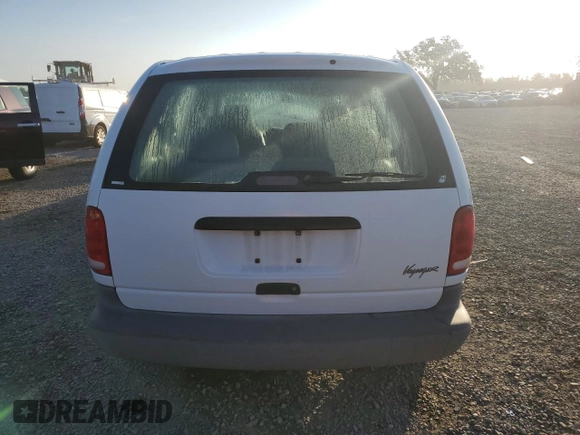2000 Plymouth Voyager z VIN 2P4GP2534YR645983, wystawiony jako Copart lot #80028904 z przebiegiem Nie podano mil oraz Szkody całkowita. Historia ofert i sprzedaży dostępna na DreamBid. Obrazek 6.