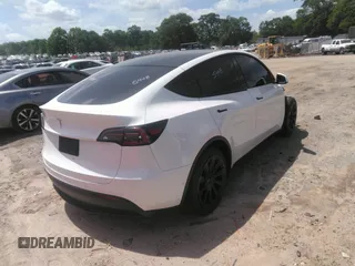 2022 Tesla Model Y Long Range z VIN 7SAYGDEE3NF385933, wystawiony jako IAAI lot #42059675 z przebiegiem 88 488 mil mil oraz . Historia ofert i sprzedaży dostępna na DreamBid. Obrazek 4.