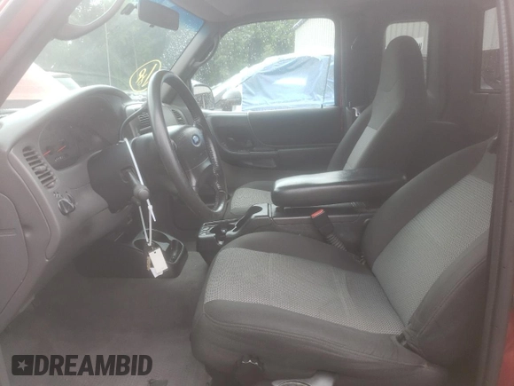 2003 Ford Ranger XL Fleet with VIN 1FTZR45E23PB21049, listed as a Copart auction lot 57033605 with 152,889 mi miles and Salvage title. Bid and sale history available at DreamBid. Image 7.