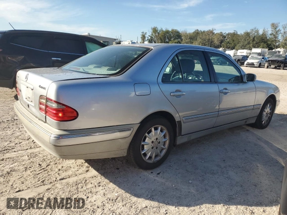 2002 Mercedes-Benz E-Class with VIN WDBJF82J92X067535, listed as a Copart auction lot 82759874 with 193,765 mi miles and Salvage Title. Bid and sale history available at carsss.com. Image 3.