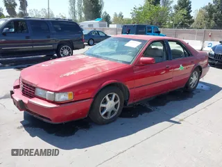 1996 Cadillac Seville Touring STS with VIN 1G6KY5290TU835414, listed as a IAAI auction lot 42051767 with 185,798 mi miles. Bid and sale history available at carsss.com. Image 2.