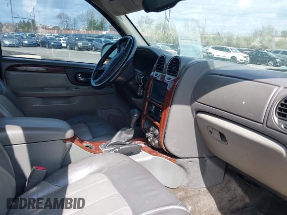 2004 GMC Envoy SLT with VIN 1GKET16S246160643, listed as a IAAI auction lot 41922915 with Not Provided miles and . Bid and sale history available at DreamBid. Image 5.
