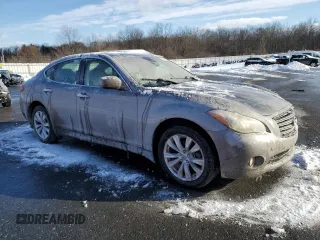 2011 Infiniti M37 with VIN JN1BY1AR7BM372583, listed as a Copart auction lot 89374015 with 192,995 mi miles and Salvage Title. Bid and sale history available at carsss.com. Image 4.