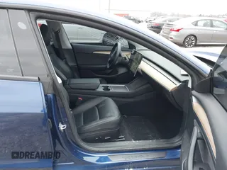 2021 Tesla Model 3 Performance with VIN 5YJ3E1EC6MF996743, listed as a IAAI auction lot 41509631 with 41,599 mi miles and . Bid and sale history available at DreamBid. Image 5.