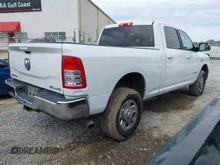 2021 Ram 2500 Big Horn z VIN 3C6UR5DL7MG542617, wystawiony jako IAAI lot #41614844 z przebiegiem 66 869 mil mil oraz . Historia ofert i sprzedaży dostępna na DreamBid. Obrazek 4.