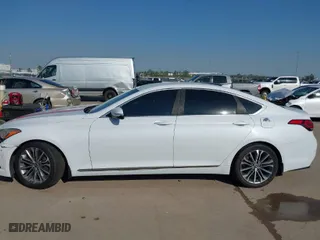 2015 Hyundai Genesis 3.8L with VIN KMHGN4JE4FU075055, listed as a IAAI auction lot 41678074 with 126,229 mi miles. Bid and sale history available at carsss.com. Image 14.