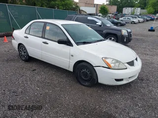 2004 Mitsubishi Lancer ES z VIN JA3AJ26E04U044304, wystawiony jako IAAI lot #42408636 z przebiegiem 232 865 mil mil oraz . Historia ofert i sprzedaży dostępna na DreamBid. Obrazek 1.