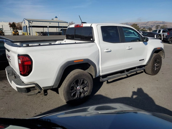 2024 GMC Canyon 2WD Elevation with VIN 1GTP5BEK1R1144007, listed as a Copart auction lot 84437474 with 7,278 mi miles and Salvage Title. Bid and sale history available at carsss.com. Image 3.