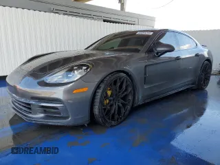 2017 Porsche Panamera with VIN WP0AA2A77HL101667, listed as a Copart auction lot 60095244 with Not provided miles and Salvage title. Bid and sale history available at DreamBid. Image 1.