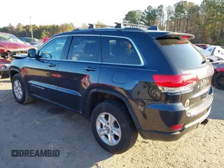 2014 Jeep Grand Cherokee Laredo with VIN 1C4RJEAG3EC218128, listed as a IAAI auction lot 40951611 with 119,596 mi miles and . Bid and sale history available at DreamBid. Image 3.
