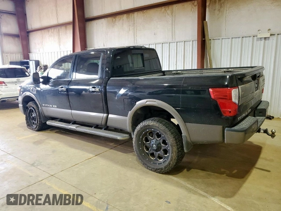 2016 Nissan Titan Pro-4X with VIN 1N6BA1F44GN509606, listed as a Copart auction lot 62336625 with 258,040 mi miles and Salvage title. Bid and sale history available at DreamBid. Image 2.