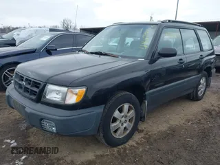 1999 Subaru Forester L with VIN JF1SF6351XH702931, listed as a IAAI auction lot 41612373 with 149,171 mi miles. Bid and sale history available at carsss.com. Image 2.