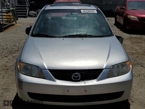 2002 Mazda Protege DX z VIN JM1BJ225920543960, wystawiony jako Copart lot #56336555 z przebiegiem 173 874 mil mil oraz Szkoda całkowita • Salvage title. Historia ofert i sprzedaży dostępna na DreamBid. Obrazek 5.