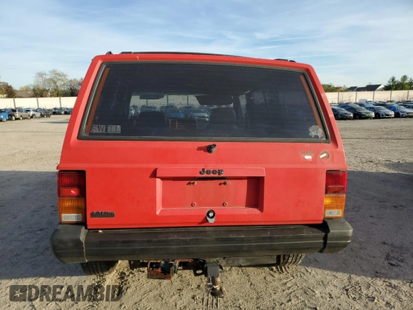 1994 Jeep Cherokee Sport with VIN 1J4FJ68S3RL239208, listed as a Copart auction lot 79121184 with 226,579 mi miles and Salvage title. Bid and sale history available at DreamBid. Image 6.